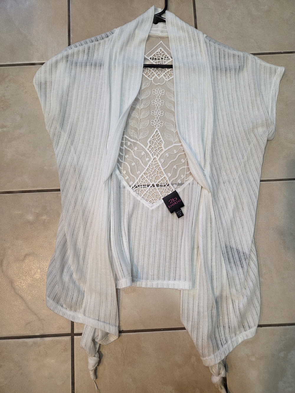 bebe Open-Front Ribbed Knit Shrug in Light Cream with Subtle Stripes